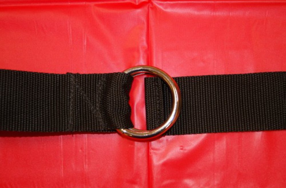A Mat Strap cinching a rolled competition mat closed with a zinc-plated steel D-ring